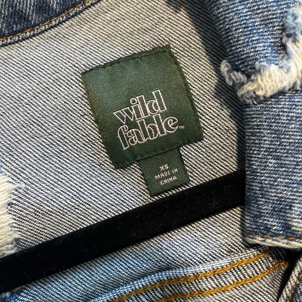 Sleeveless, distressed jean vest - Picture 5 of 5